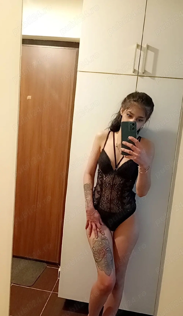 Buna numele este Alexandra am 26 de ani
